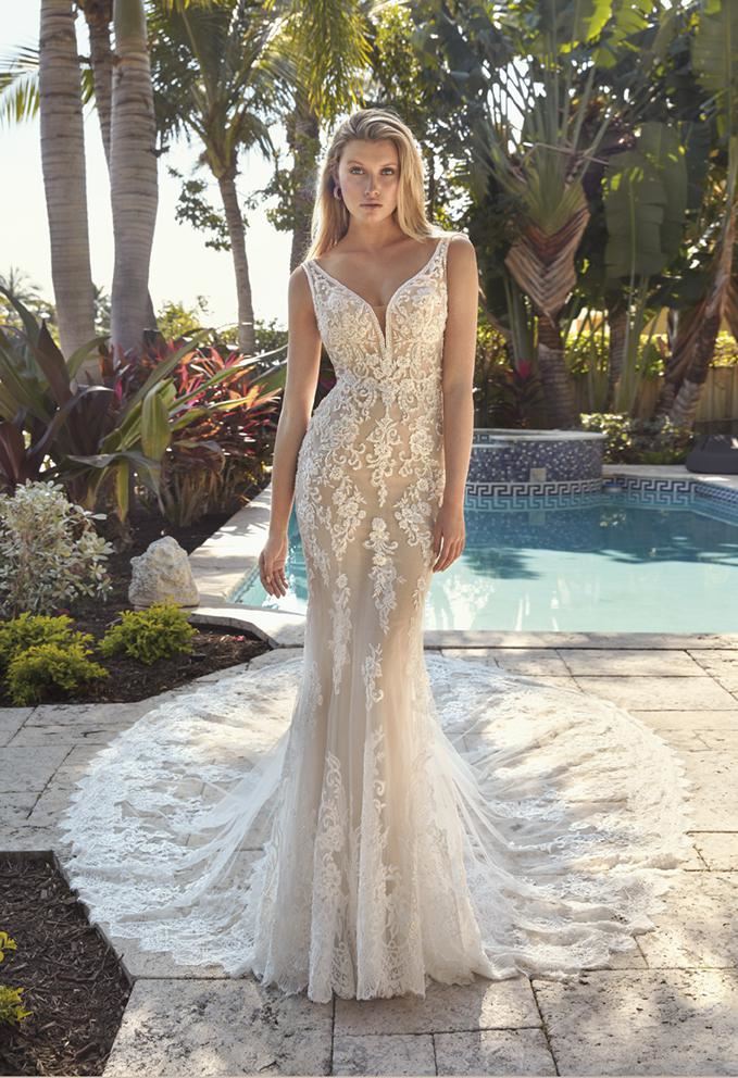 Gorgeous nude color lace mermaid gown with a beautiful train bridal dress