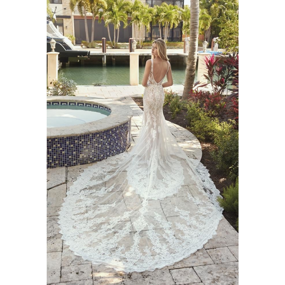 Gorgeous nude color lace mermaid gown with a beautiful train bridal dress