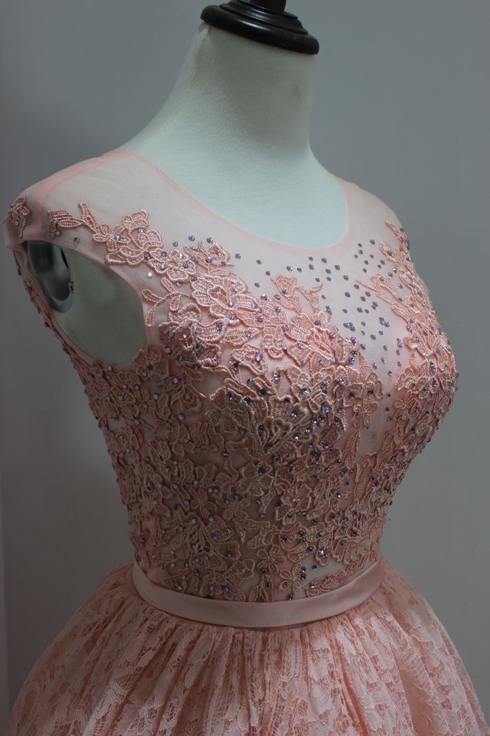 Pink color cap sleeves cocktail dress with lace and beading details