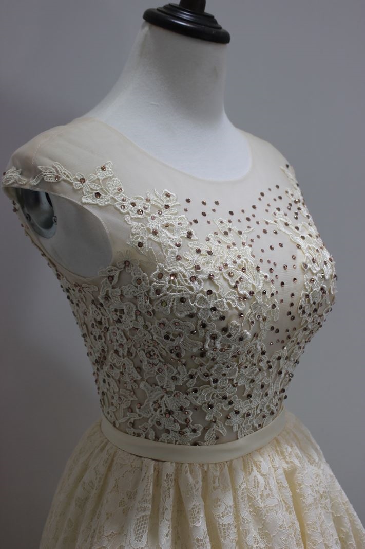 Dark ivory color cap sleeves cocktail dress with lace and beading details