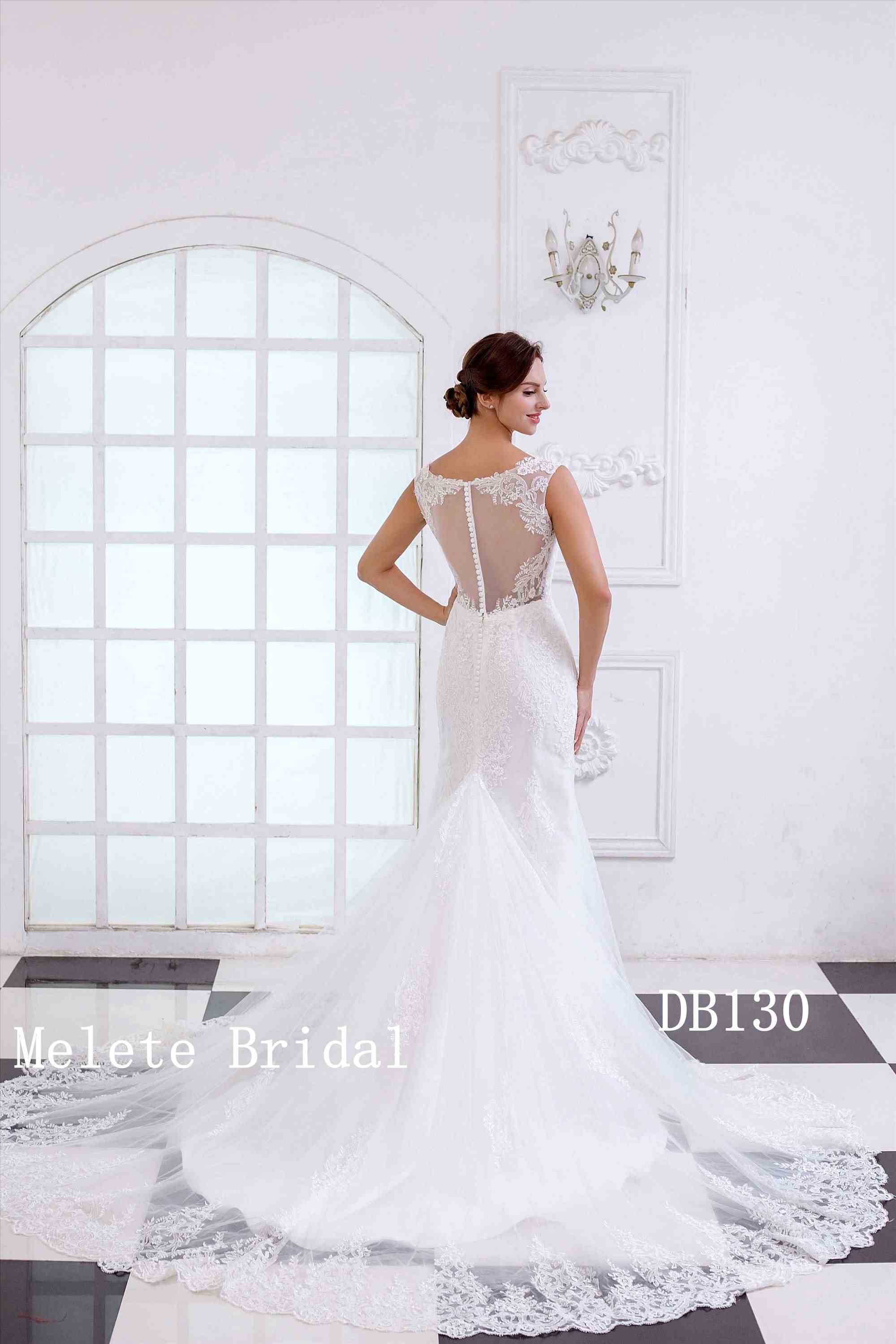 Modern design mermaid bridal gown with see through back