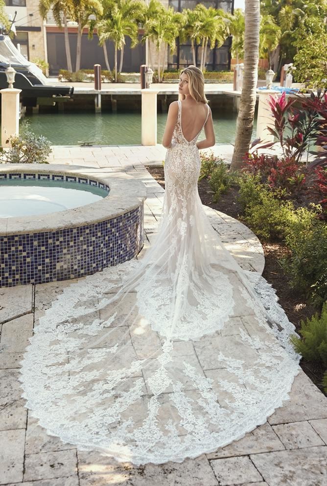 Gorgeous nude color lace mermaid gown with a beautiful train bridal dress