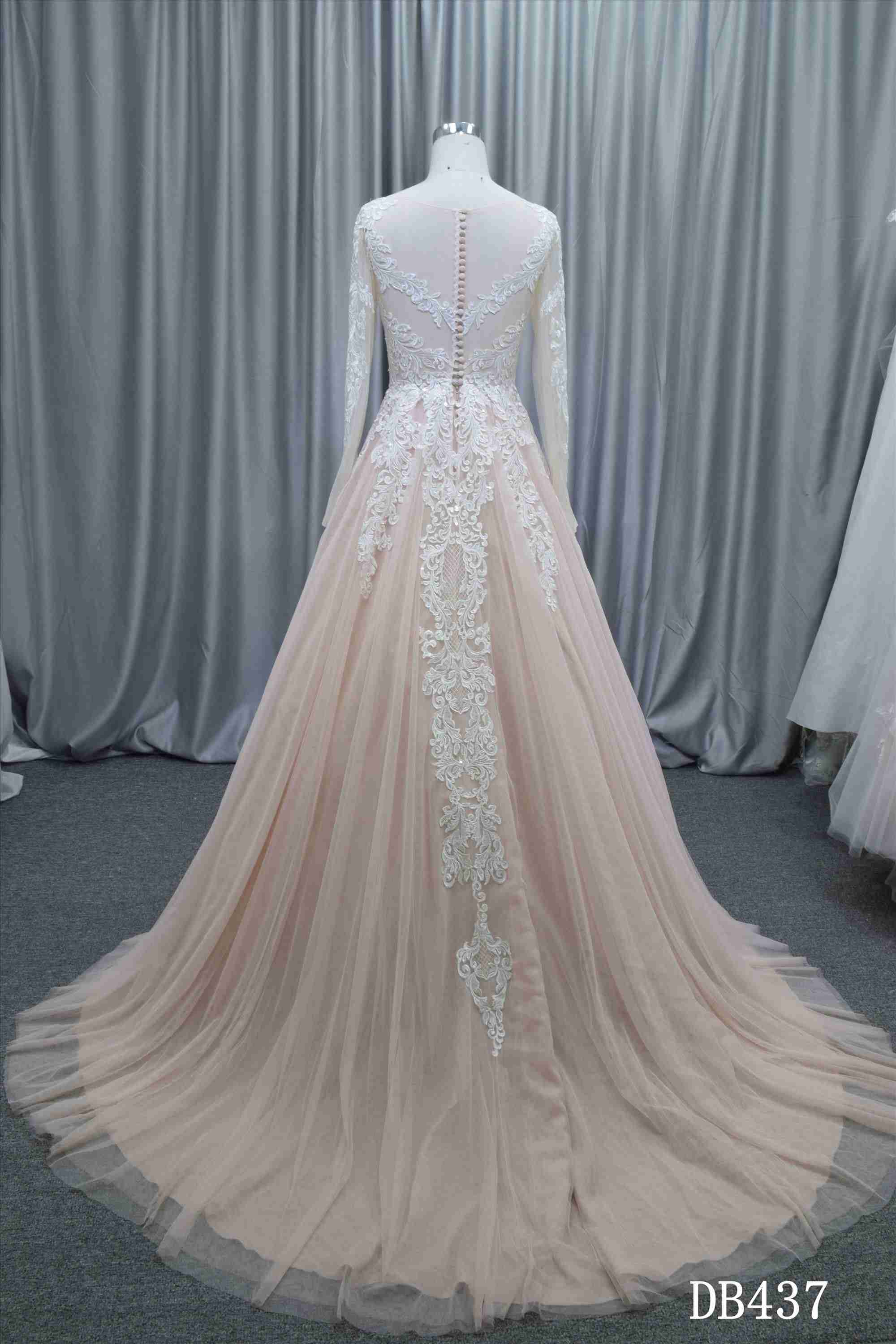 Popular blush color illusion bodice ball gown wholesale price bridal gown