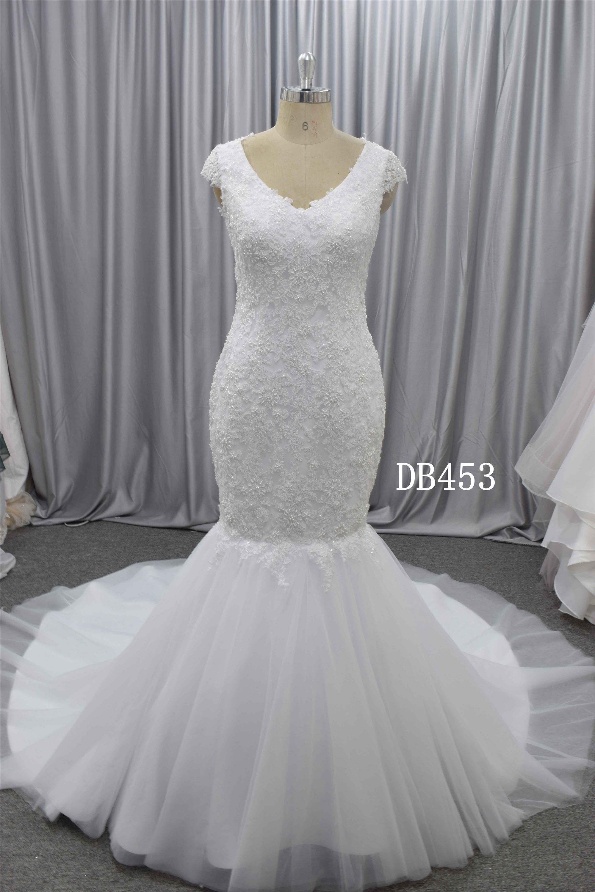 Beautiful mermaid wedding dress with delicate lace and beading