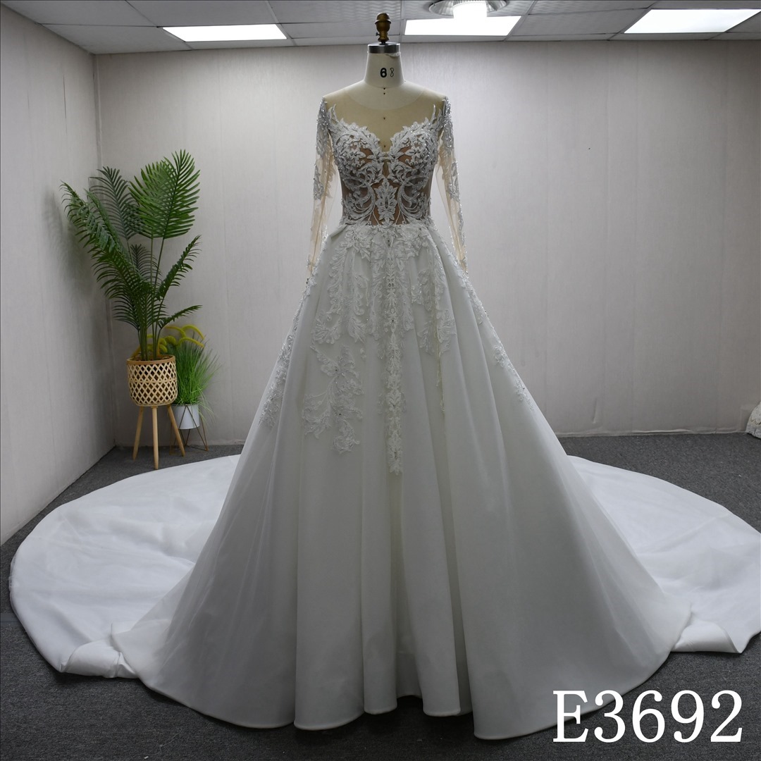 Elegant long sleeve lace beaded diamond A-line bridal gown