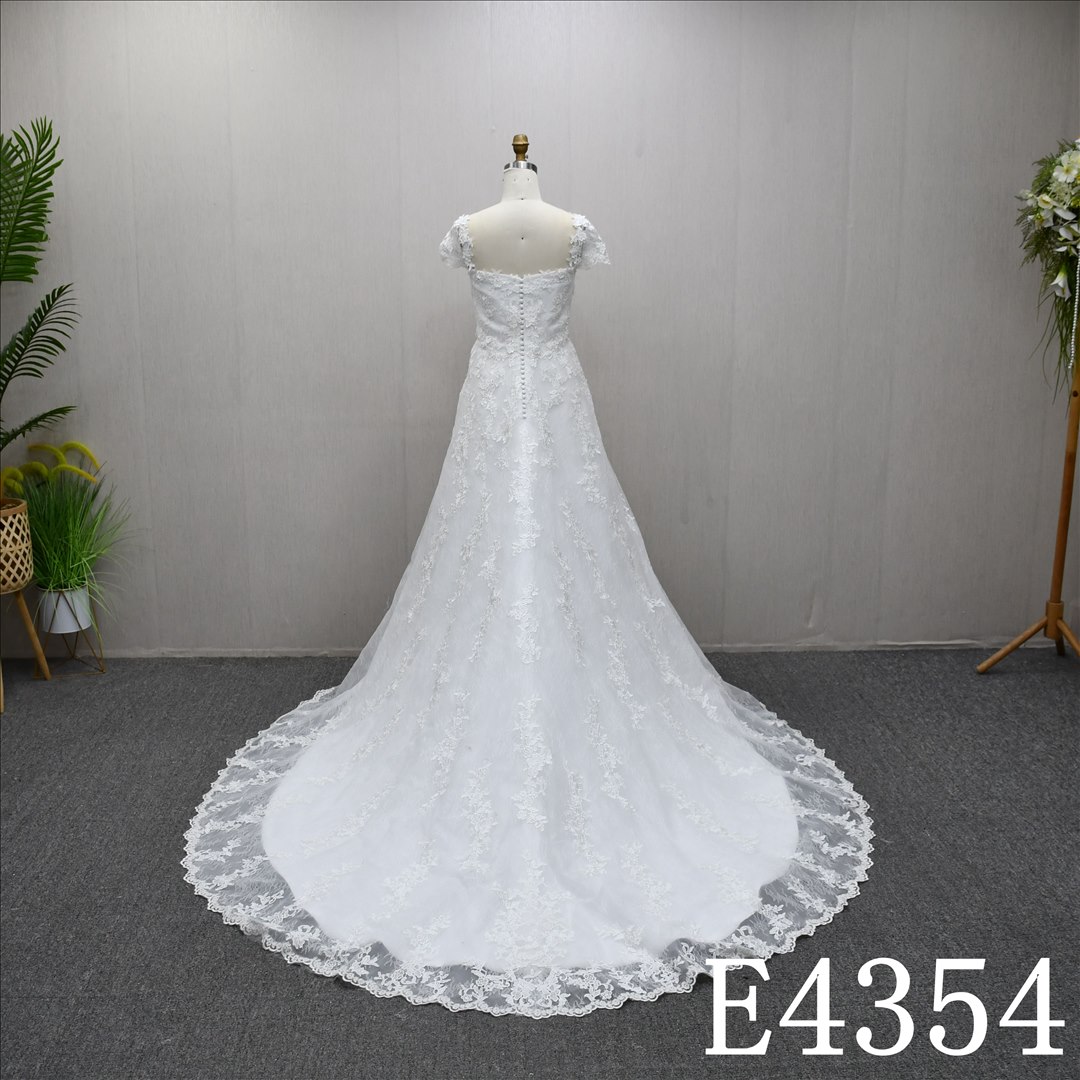 This Stain A-line Boat Neckline dress features a simple design with Lace flower