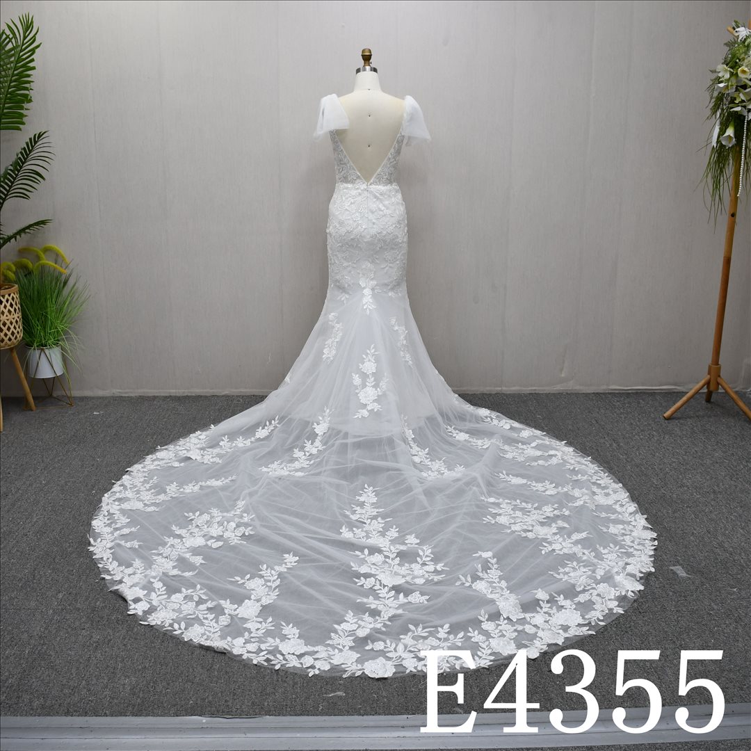 This Chiffon Mermaid V Neckline dress features a simple design with Lace flower