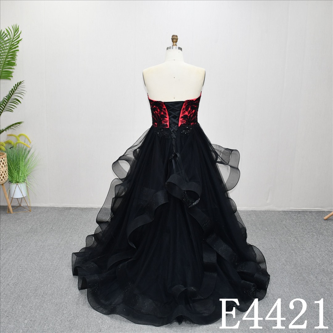 This Tulle A-line Sweetheart dress features a simple design with Lace Flower