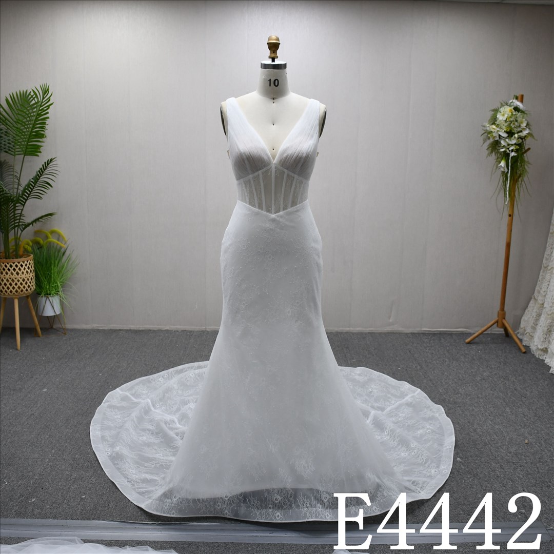 This Tulle Mermaid V Neckline dress features a simple design with Lace flower