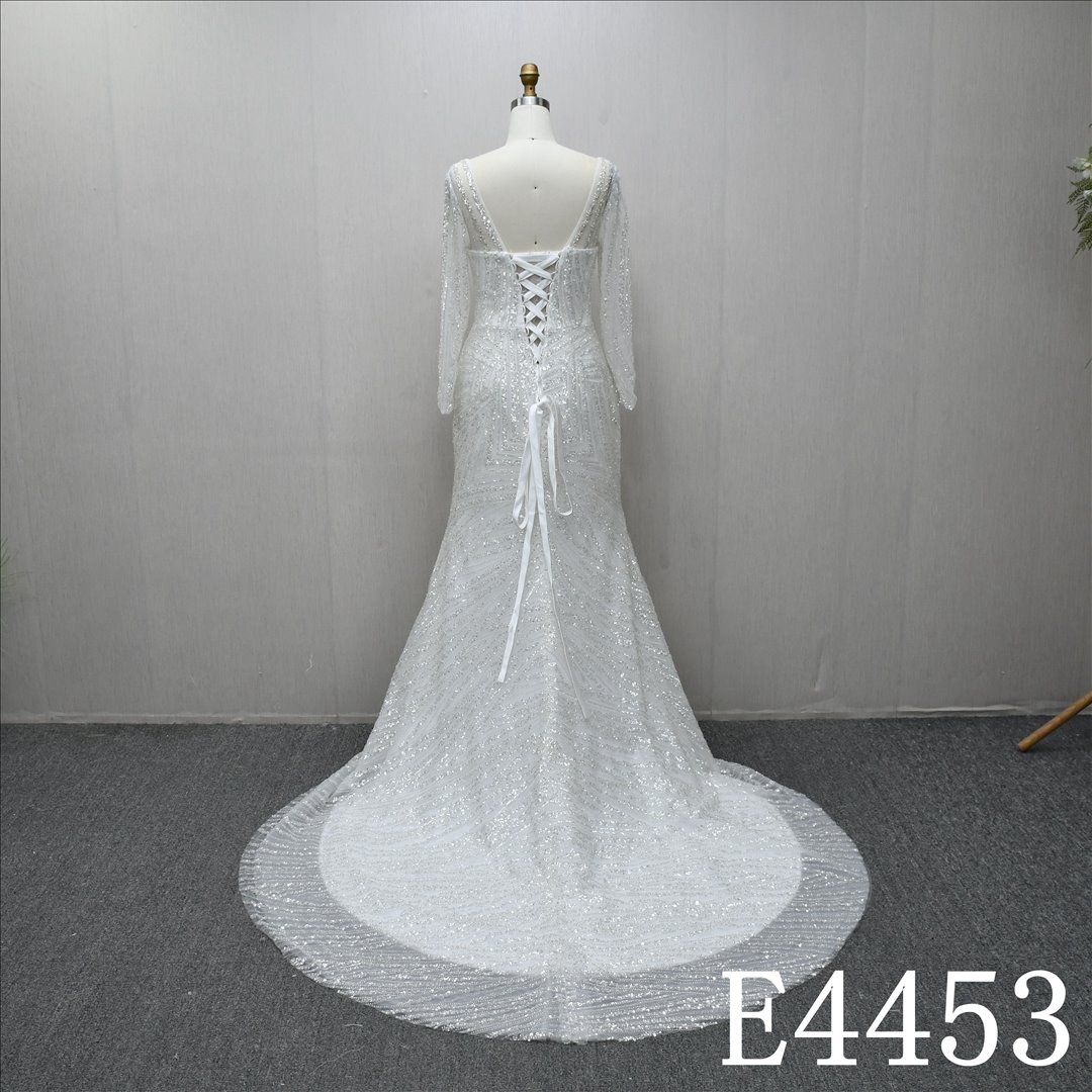 This Tulle Mermaid Sweetheart dress features a simple design with Beading