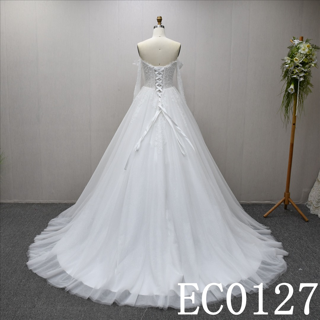 This Tulle Ball Gown Sweetheart dress features a simple design with Beading