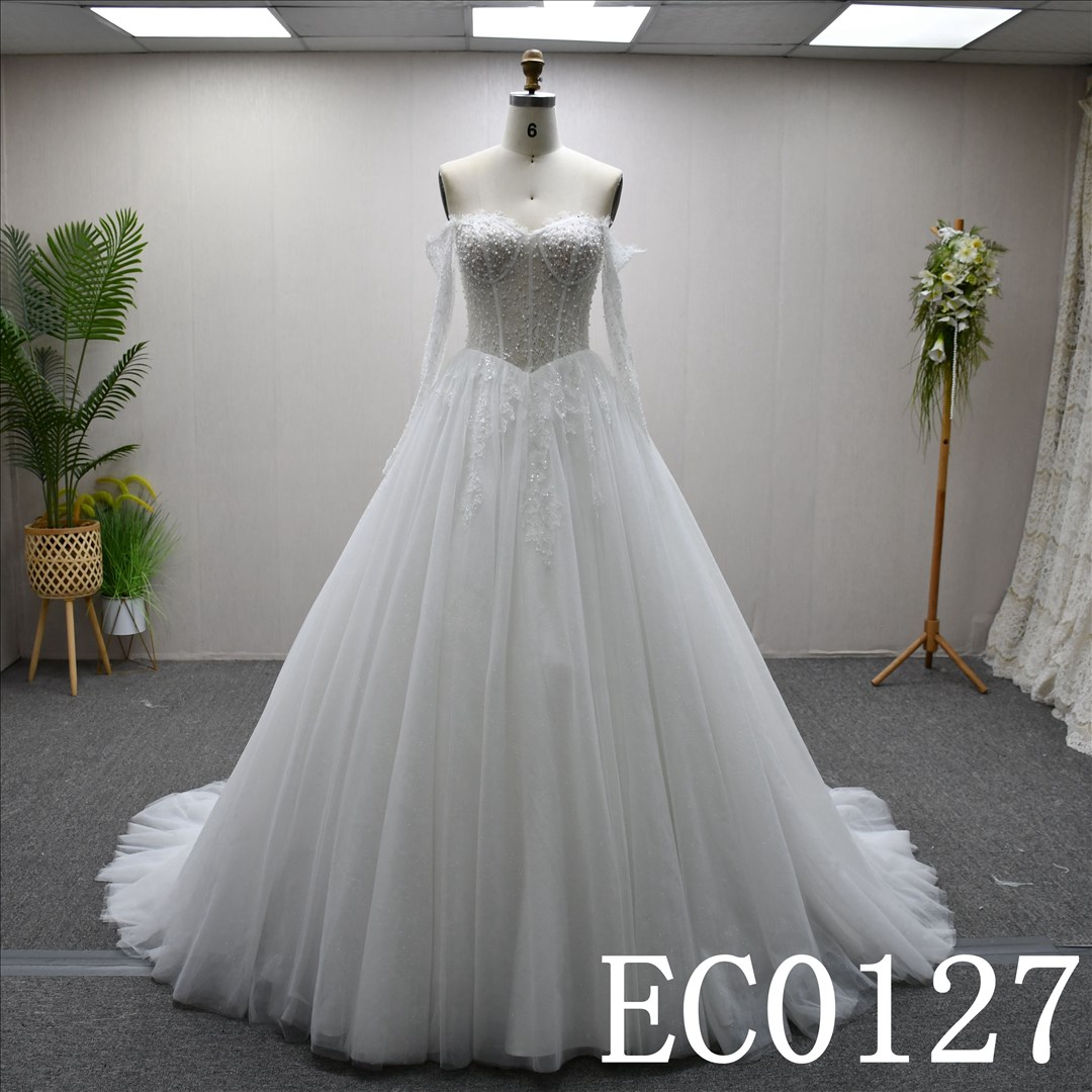 This Tulle Ball Gown Sweetheart dress features a simple design with Beading