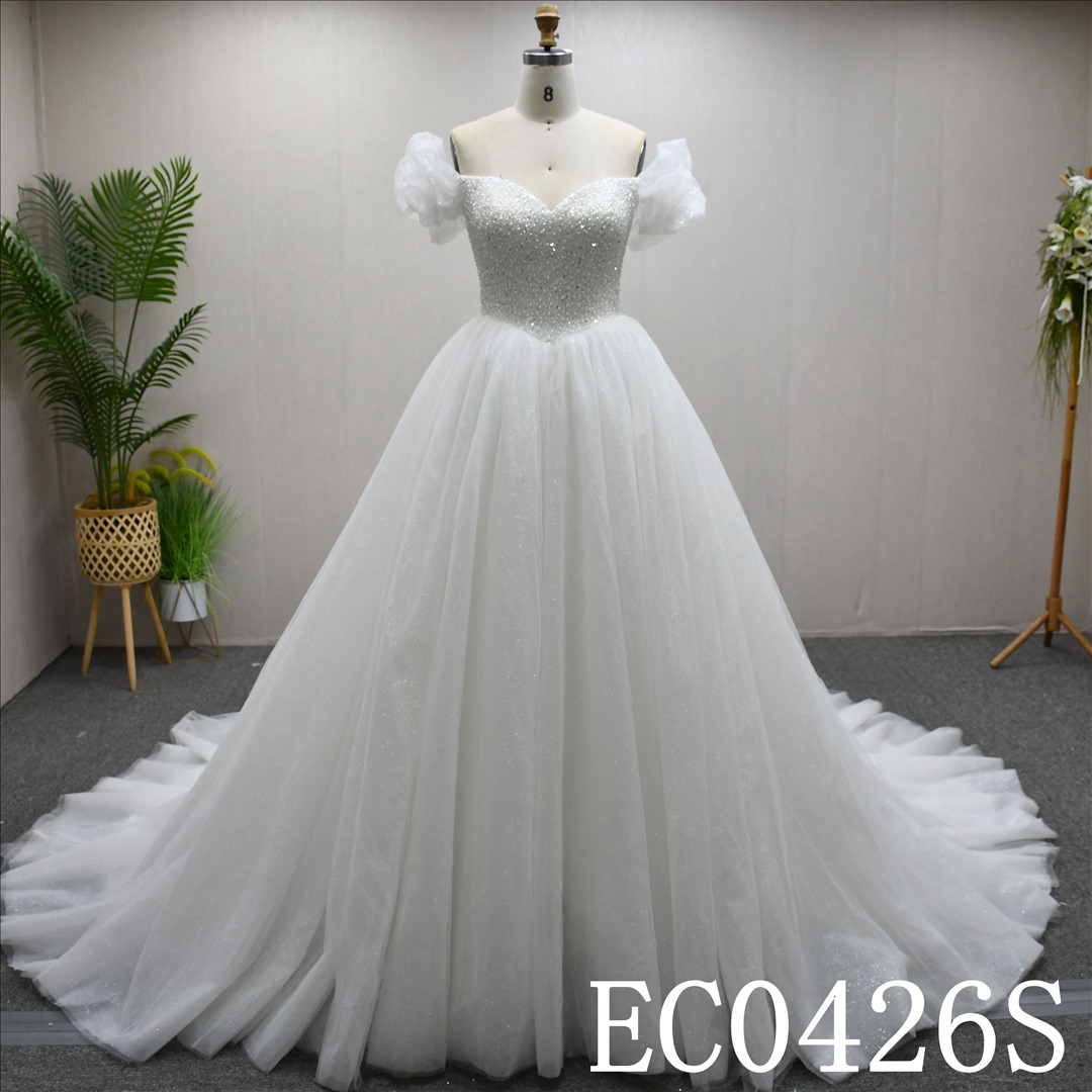 This Tulle Ball Gown Sweetheart dress features a simple design with Beading