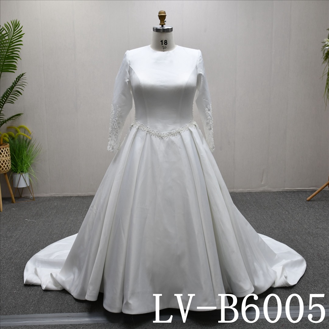 This Tulle Ball Gown Round Neck dress features a simple design with Beading