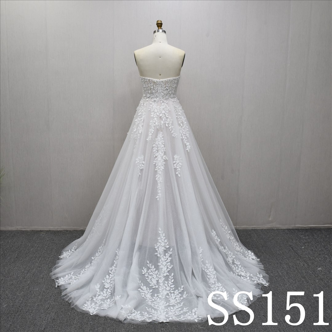 This Tulle A-line Boat Neckline dress features a simple design with Lace Flower