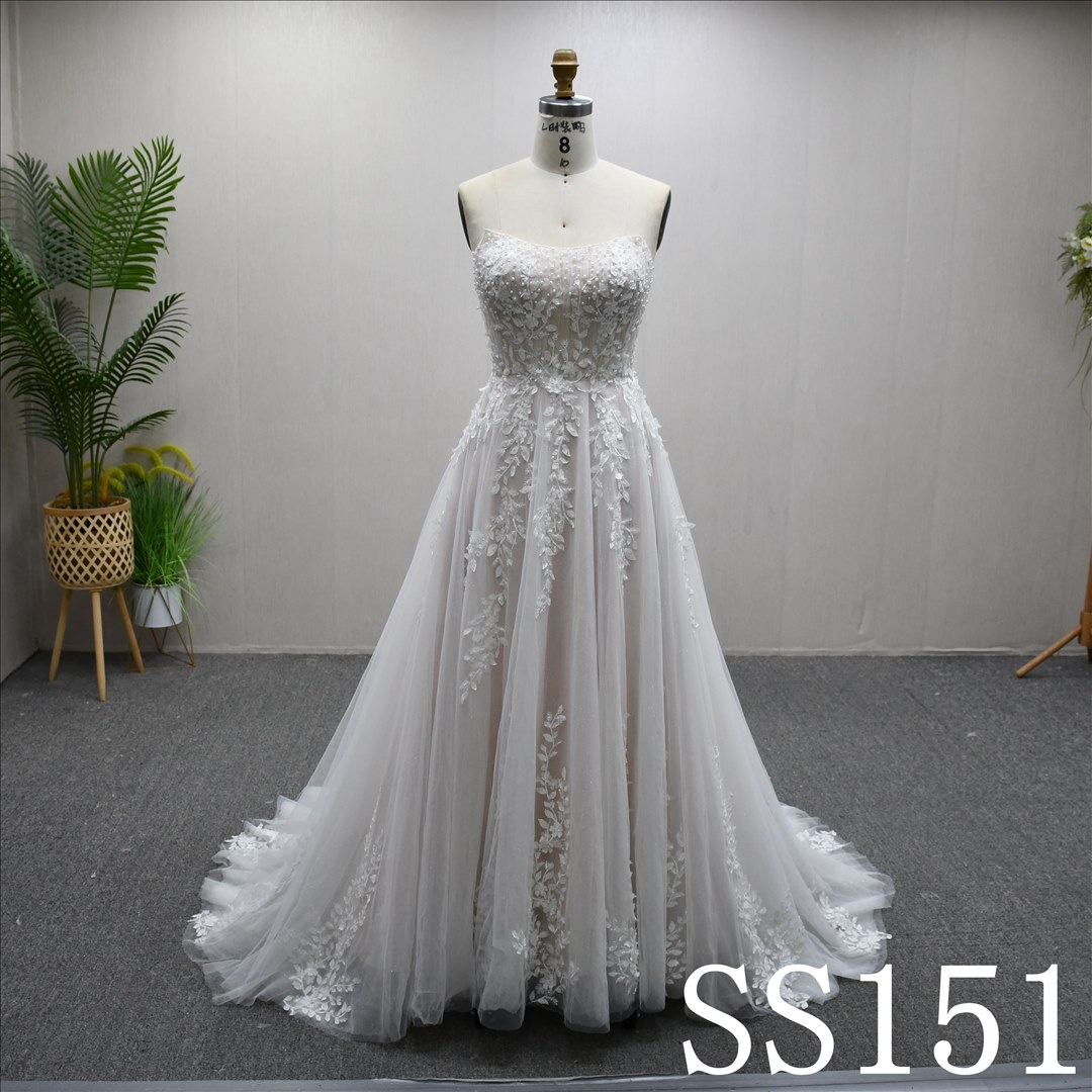 This Tulle A-line Boat Neckline dress features a simple design with Lace Flower