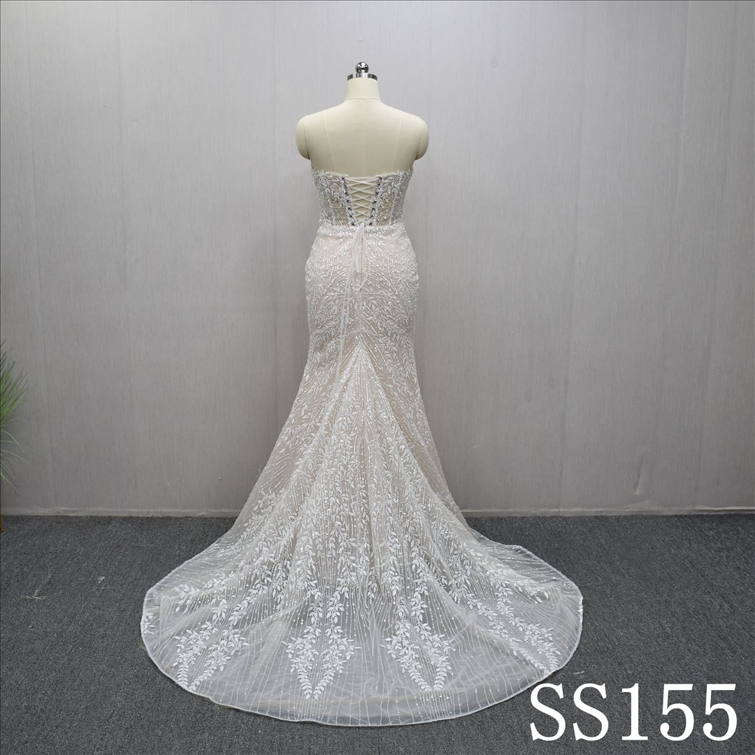 This Tulle Mermaid Sweetheart dress features a simple design with Lace Flower