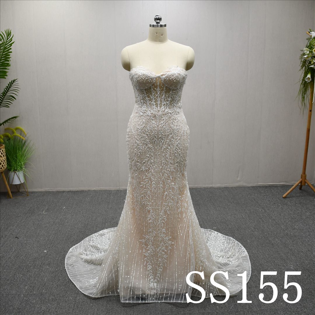 This Tulle Mermaid Sweetheart dress features a simple design with Lace Flower