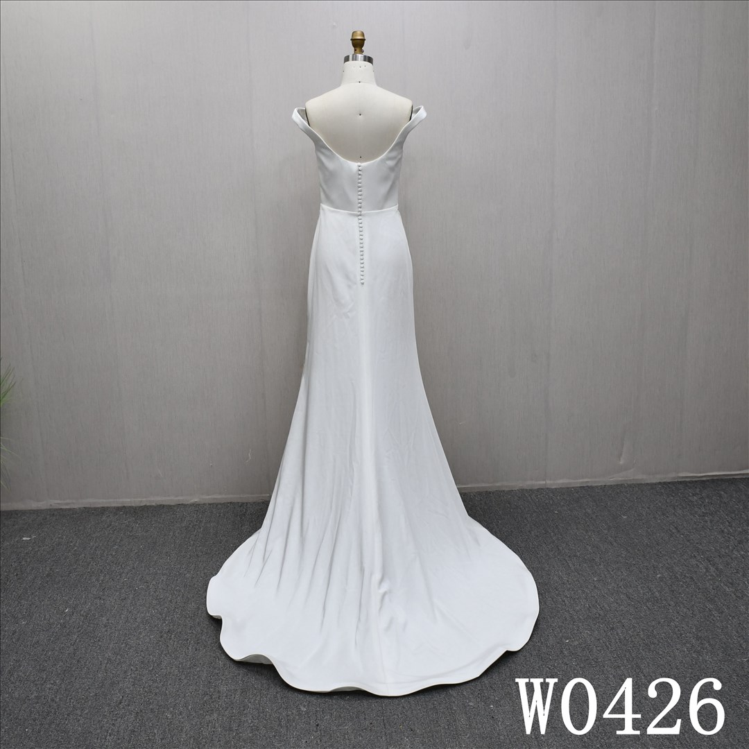 This Satin Mermaid Off Shoulder dress features a simple design with Lace Flower