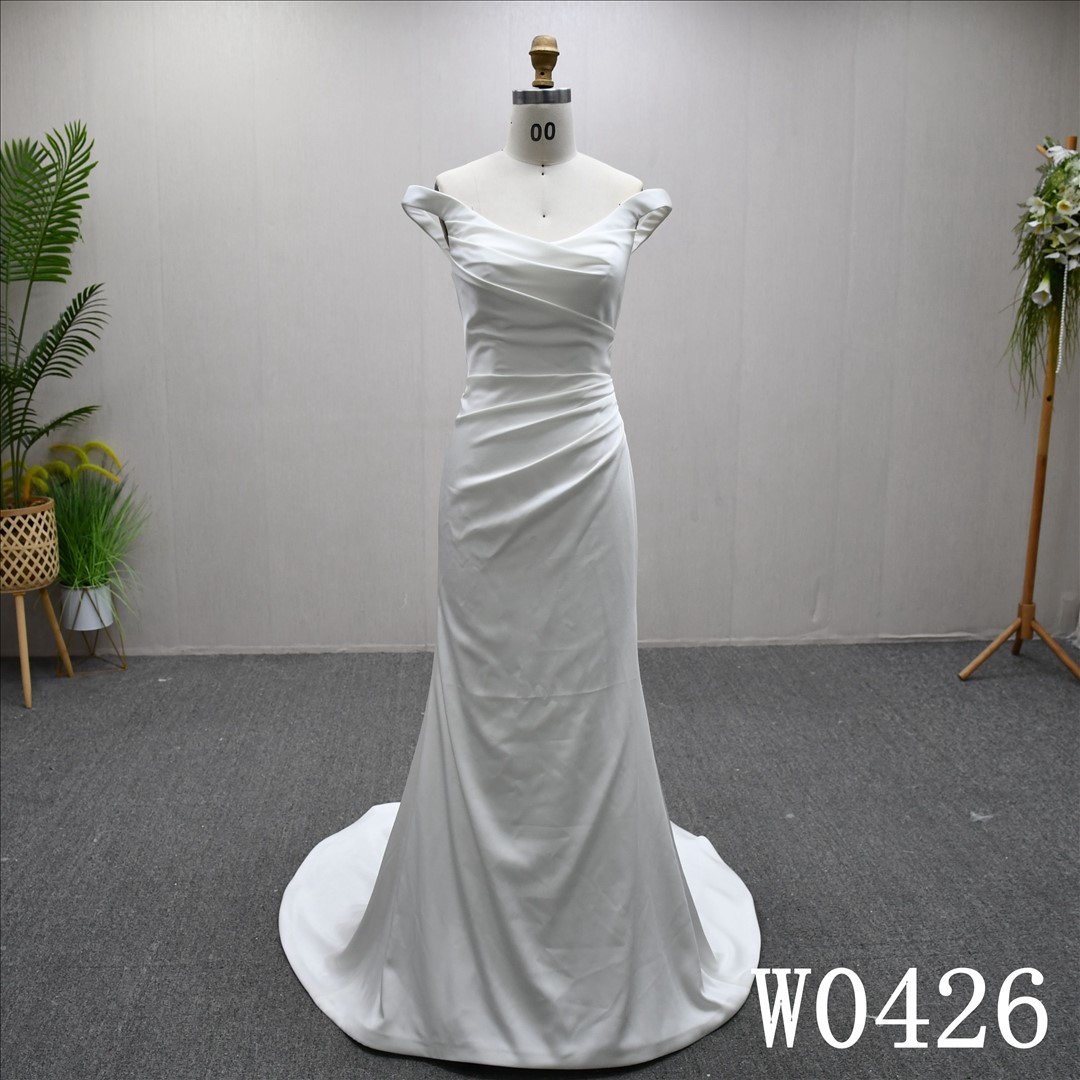 This Satin Mermaid Off Shoulder dress features a simple design with Lace Flower