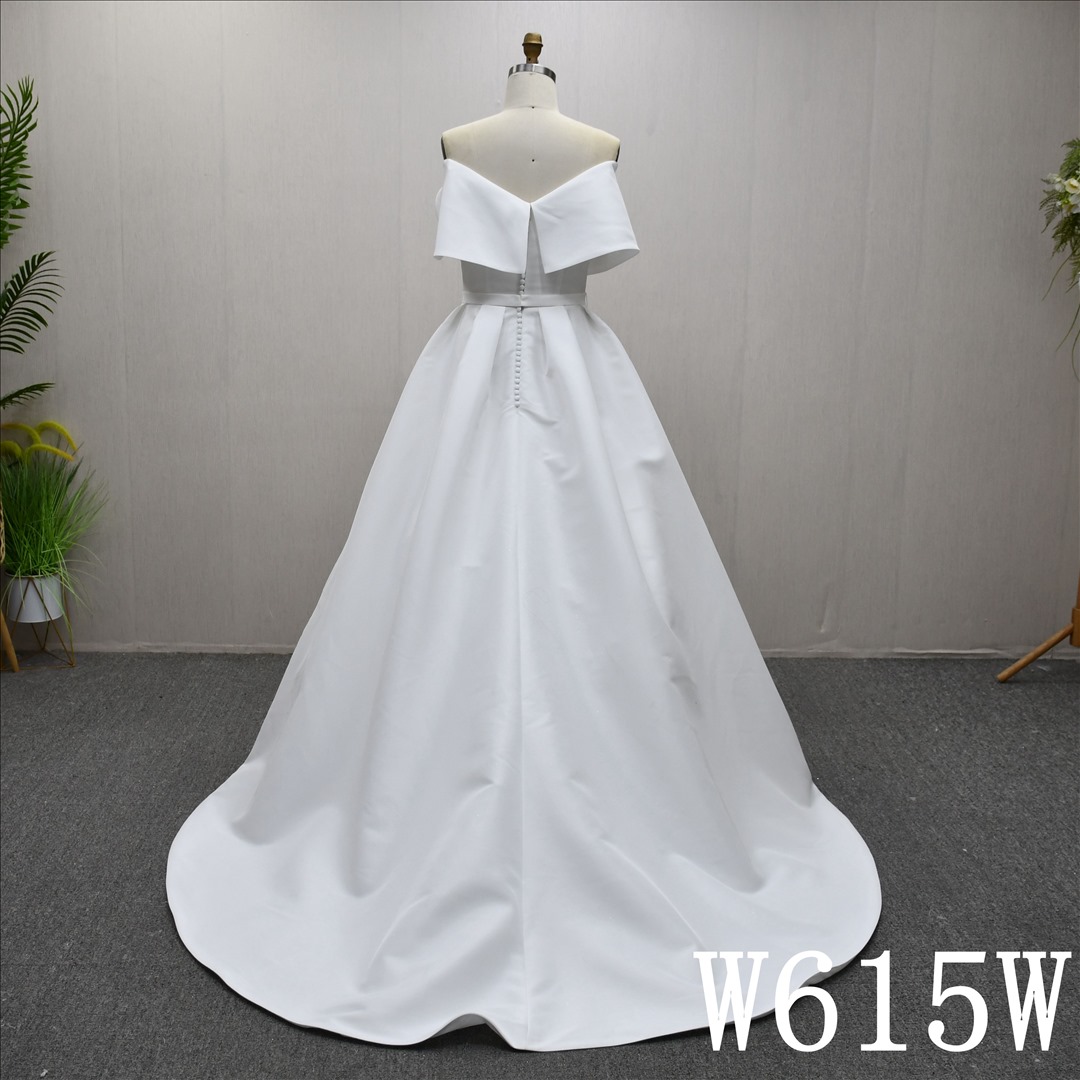This Satin Aline Off Shoulder dress features a simple design with Lace Flower