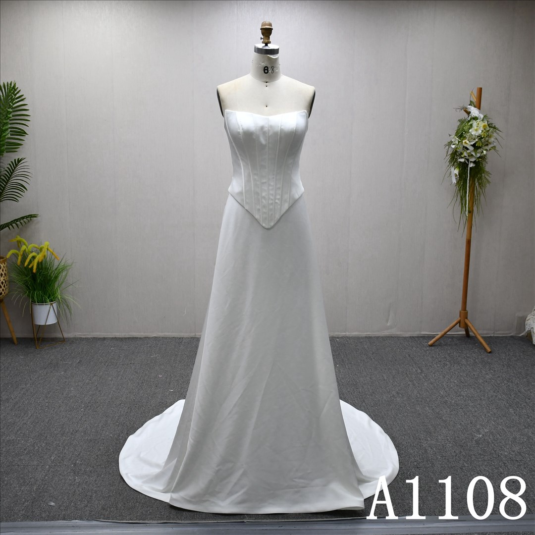 Guangzhou Bridal Dress Factory A-Line Sweetheart dress features a simple design