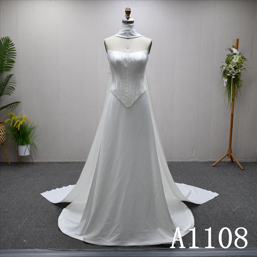 Guangzhou Bridal Dress Factory A-Line Sweetheart dress features a simple design