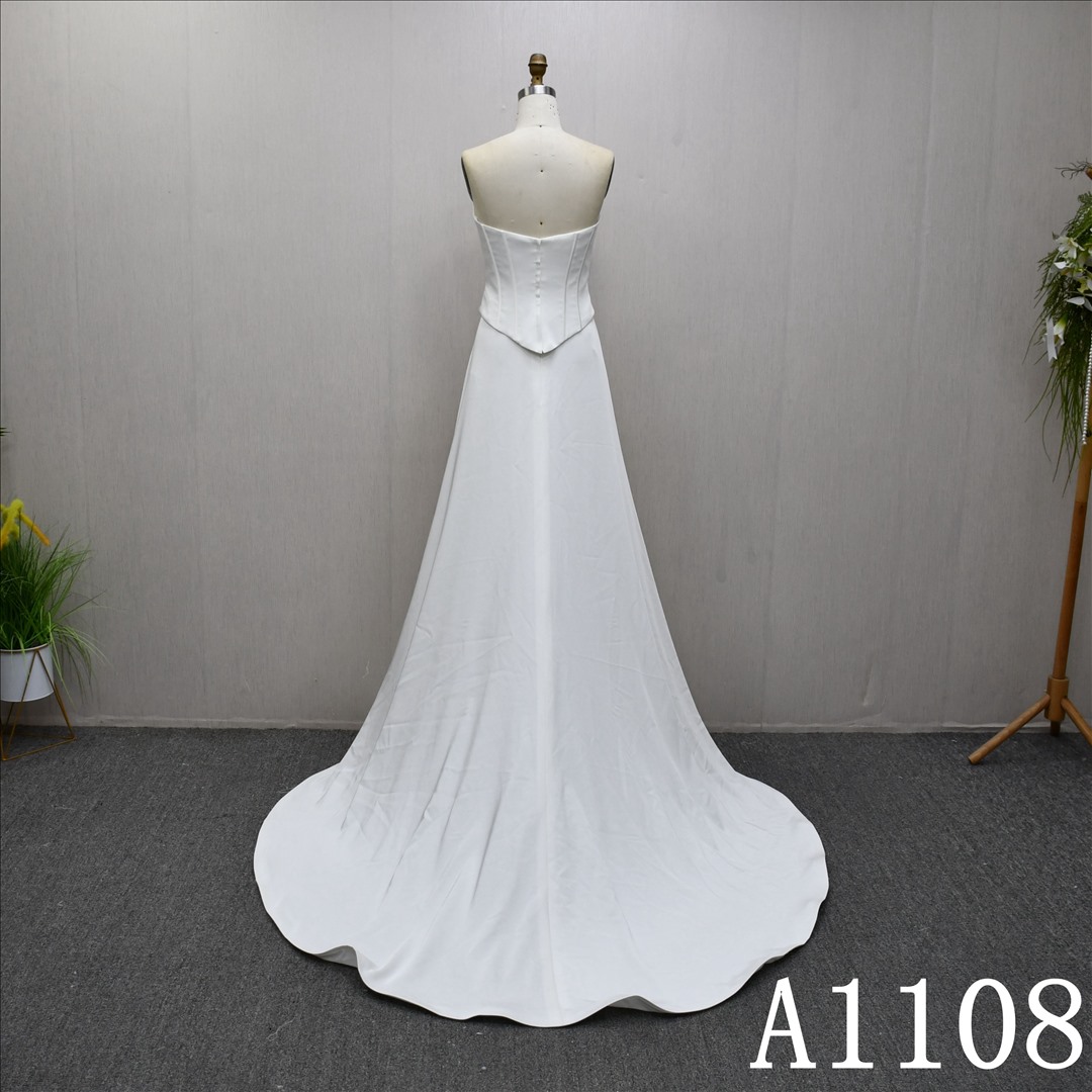 Guangzhou Bridal Dress Factory A-Line Sweetheart dress features a simple design
