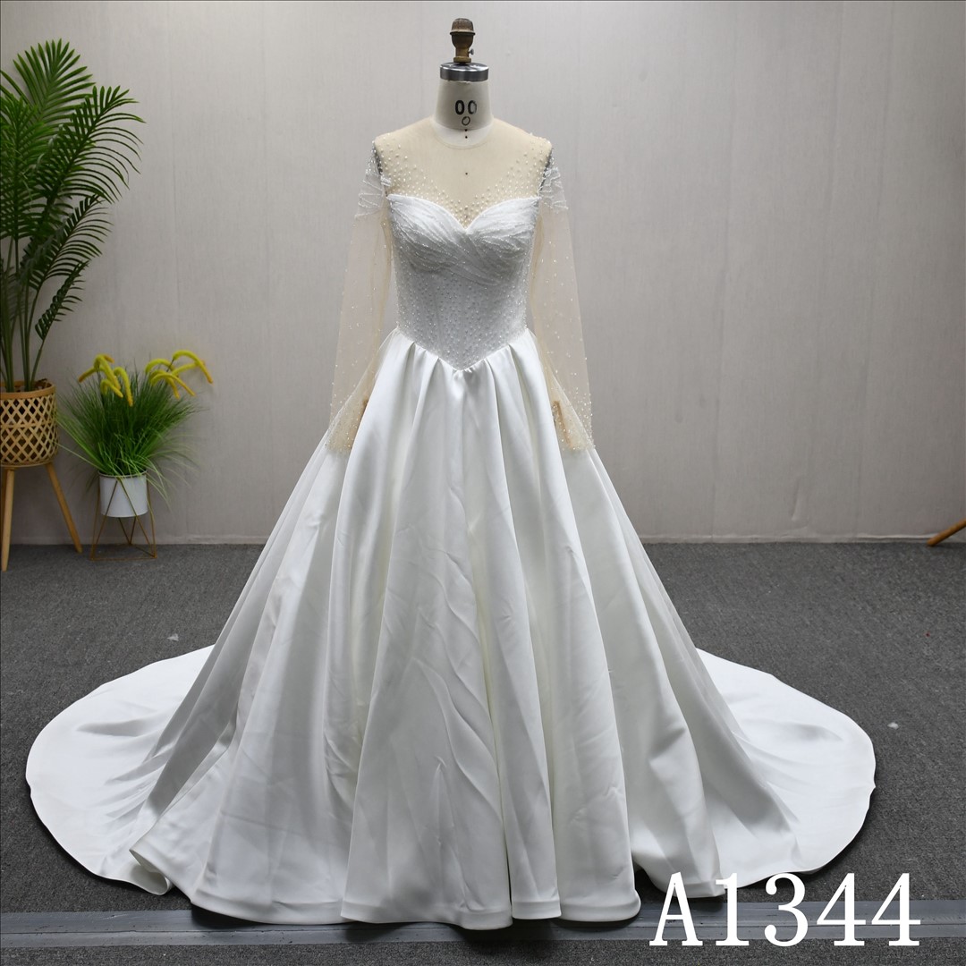 Guangzhou Bridal Gown Factory Illusion High Neck Long Beaded Sleeve A-Line Satin Wedding Dress Chapel Train Pearl Button Back Bridal Gown