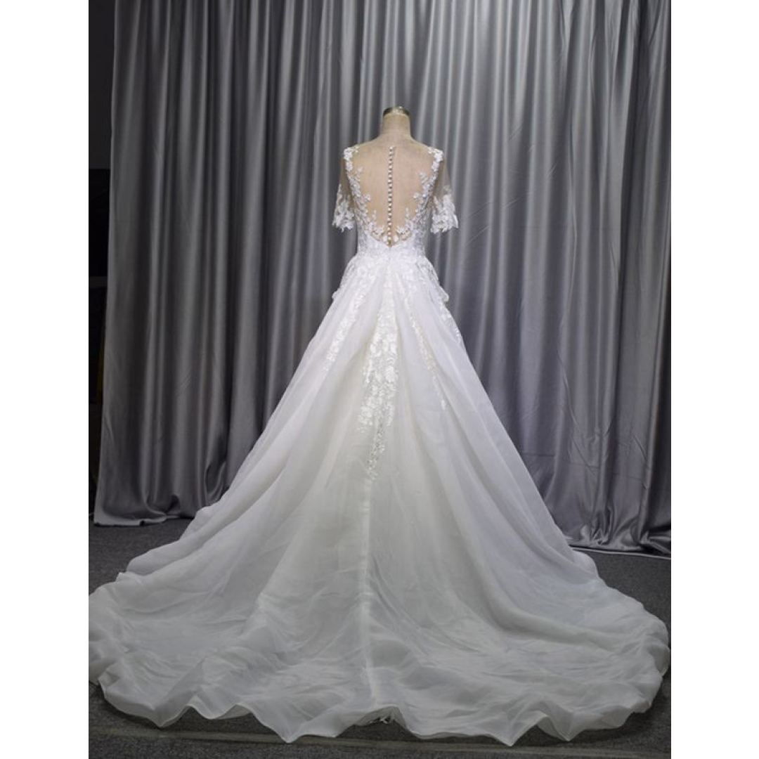 Short sleeves skin color tulle ivory organza wedding dress with a split in the front