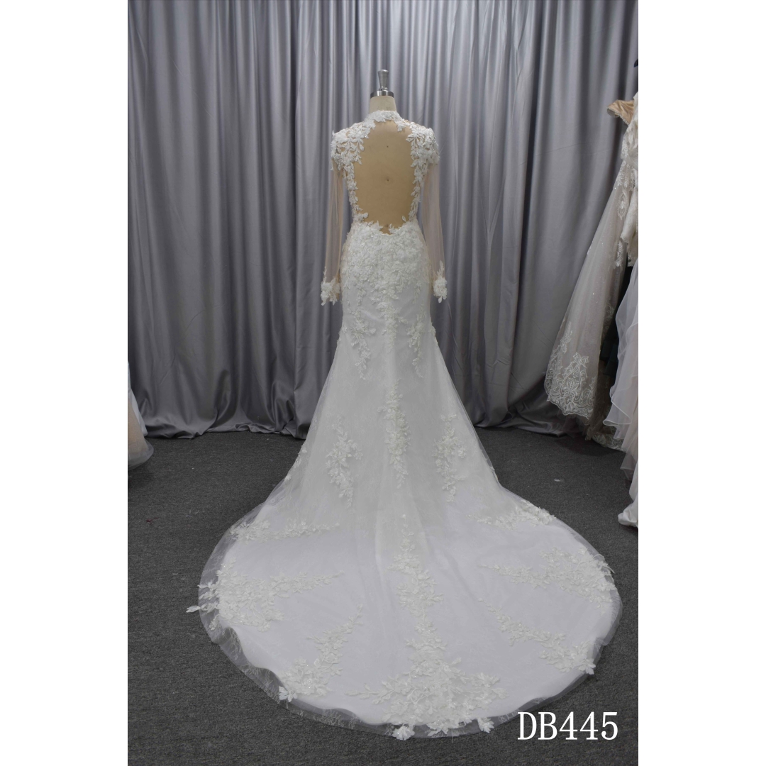 Long sleeves wedding dress with a split in the front of the skirt