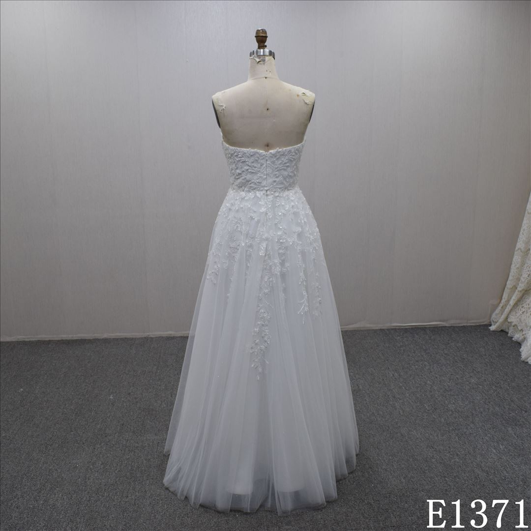 Intellectual  A-line lace appliqued strapless floor length bridal dress for women