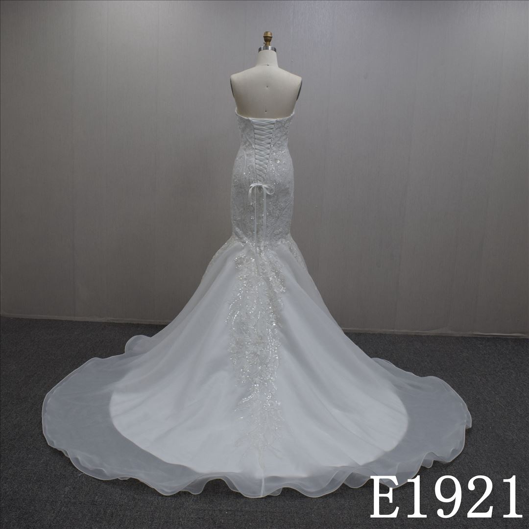 Beautiful mermaid wedding dress with delicate lace and beading