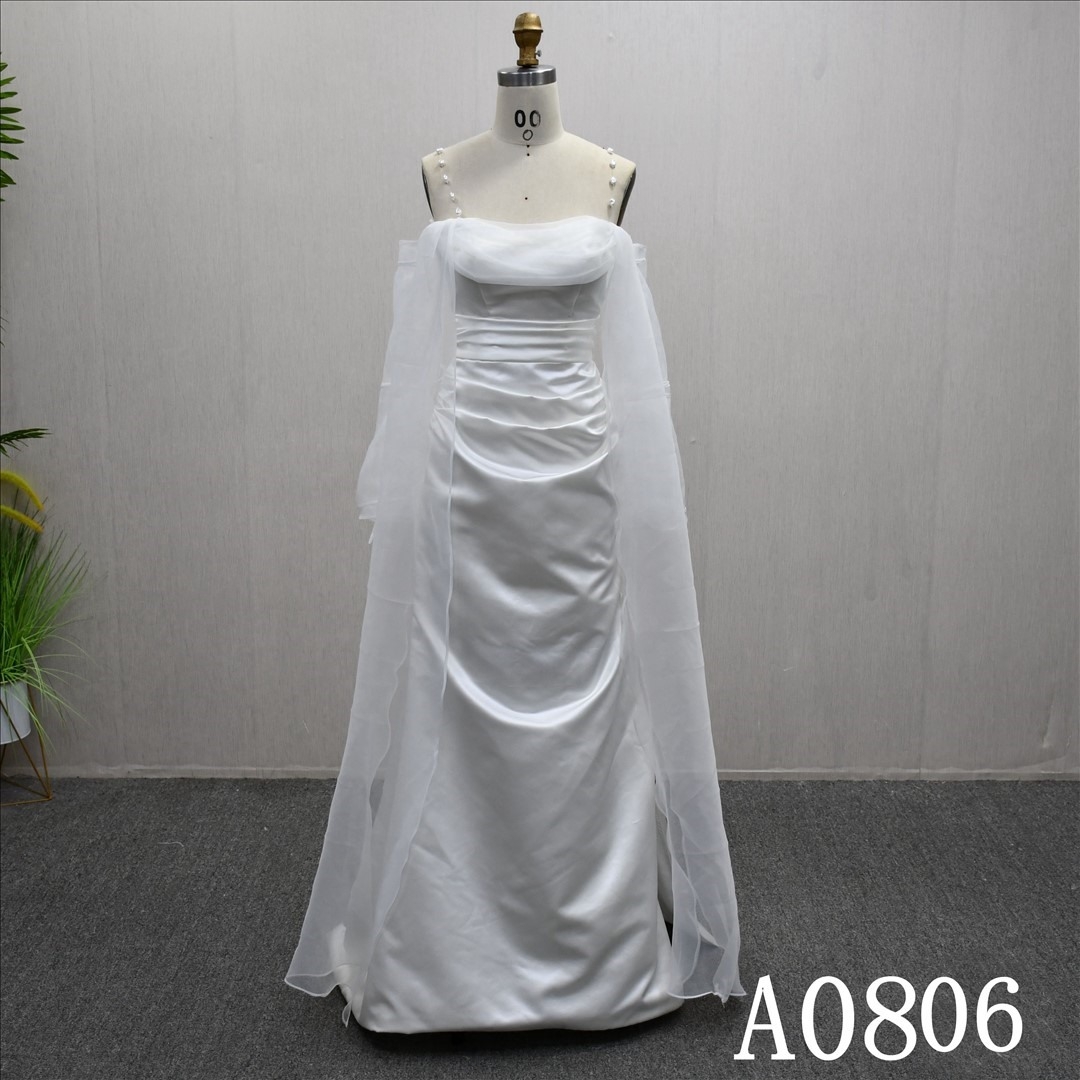 Beautiful white wedding evening dress with pearl straps