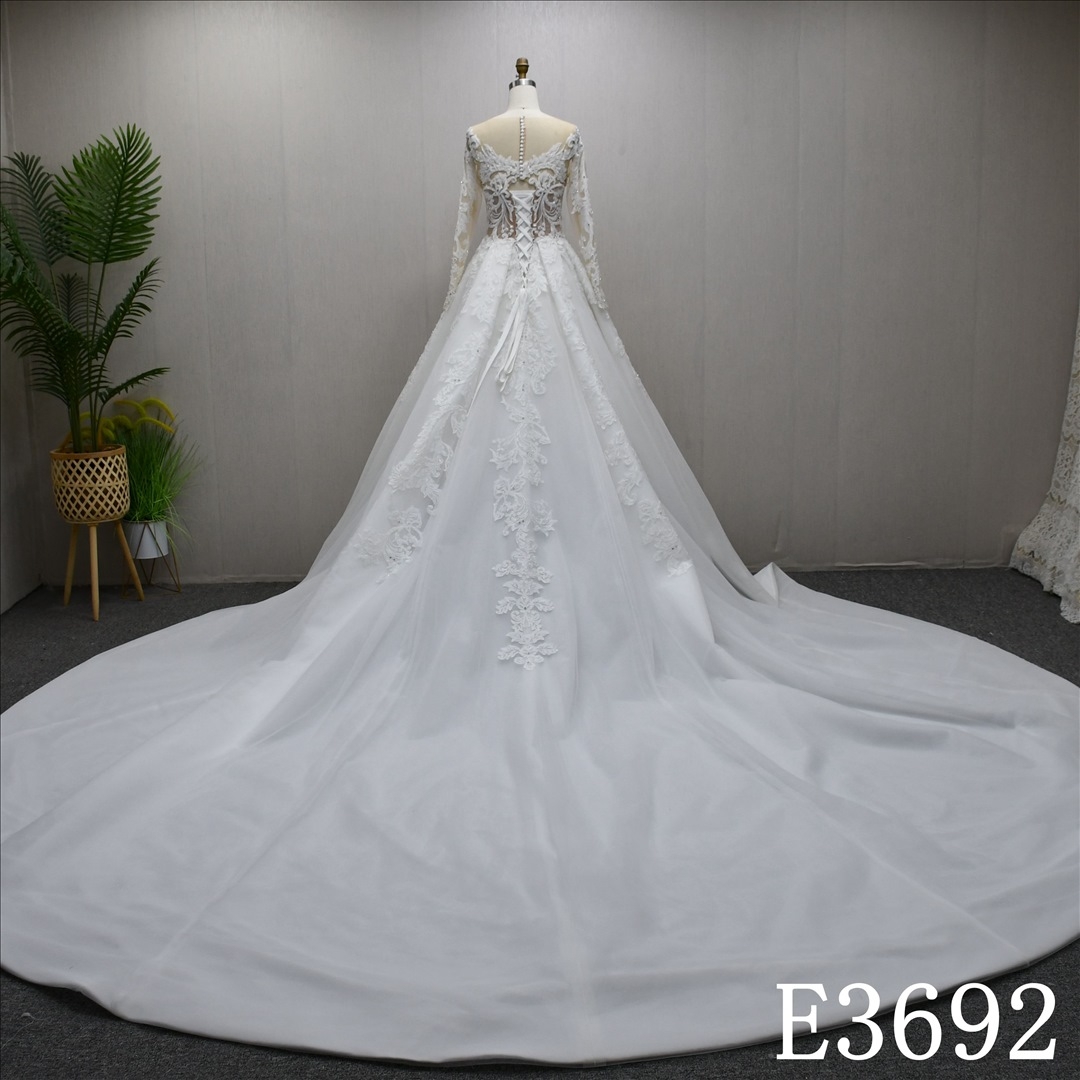 Elegant long sleeve lace beaded diamond A-line bridal gown