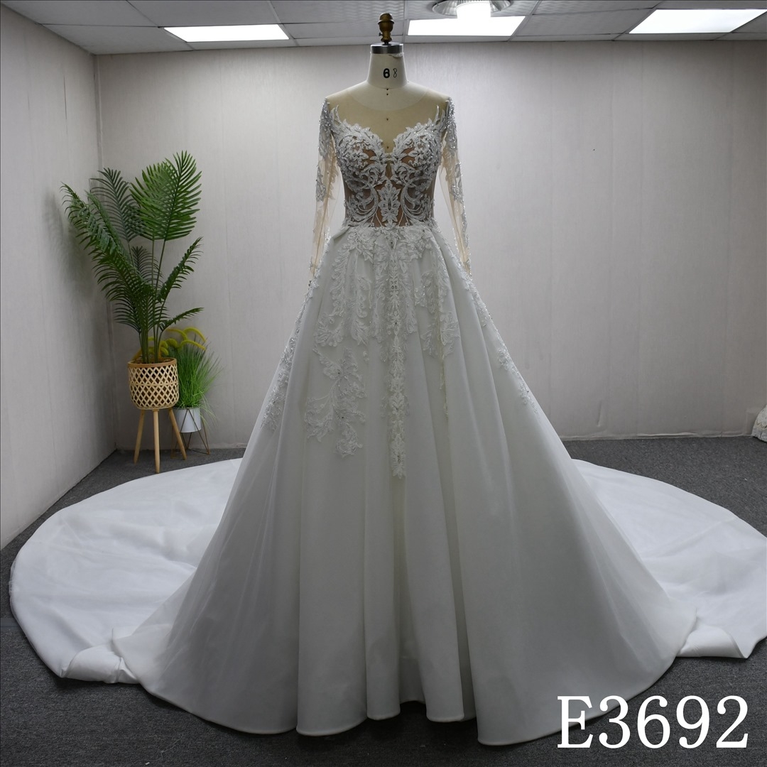 Elegant long sleeve lace beaded diamond A-line bridal gown