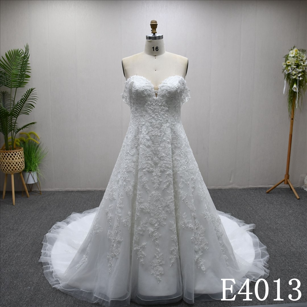Beautiful unique luxury A-line wedding evening dress with lace flowers and beading and sequins all over