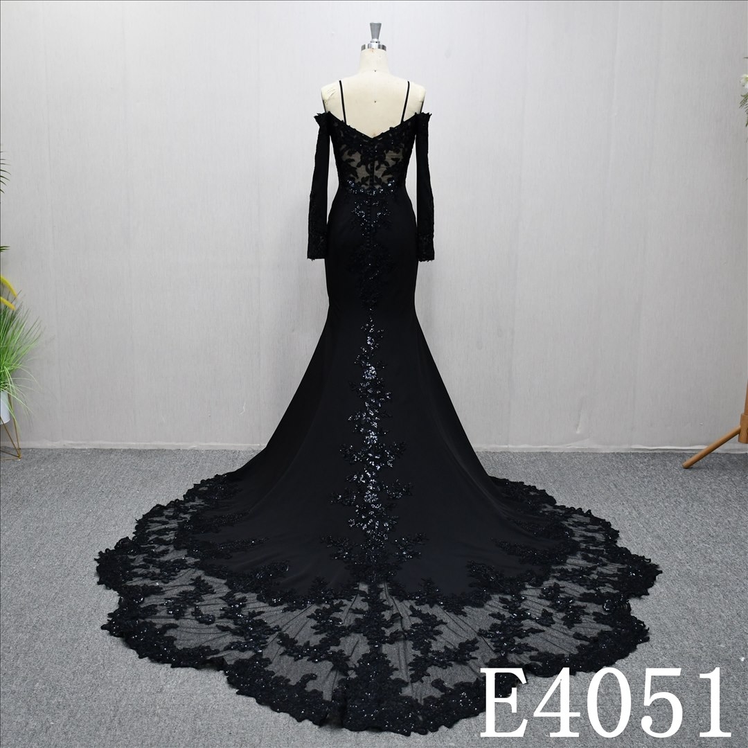 New black A-line wedding dress with unique V-neck design and back zipper and buttons