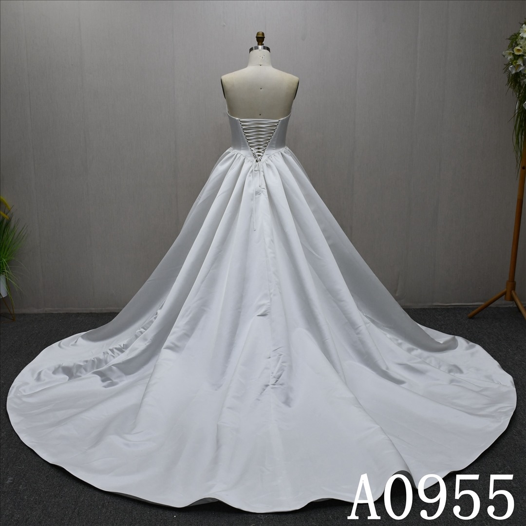 Bestselling A-line dress, simple satin design, long train wedding evening gown