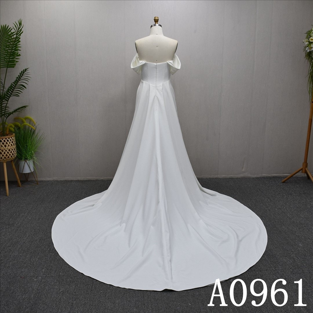 Elegant off-sleeve, minimalist design, pleated A-line wedding dress with a back zipper.