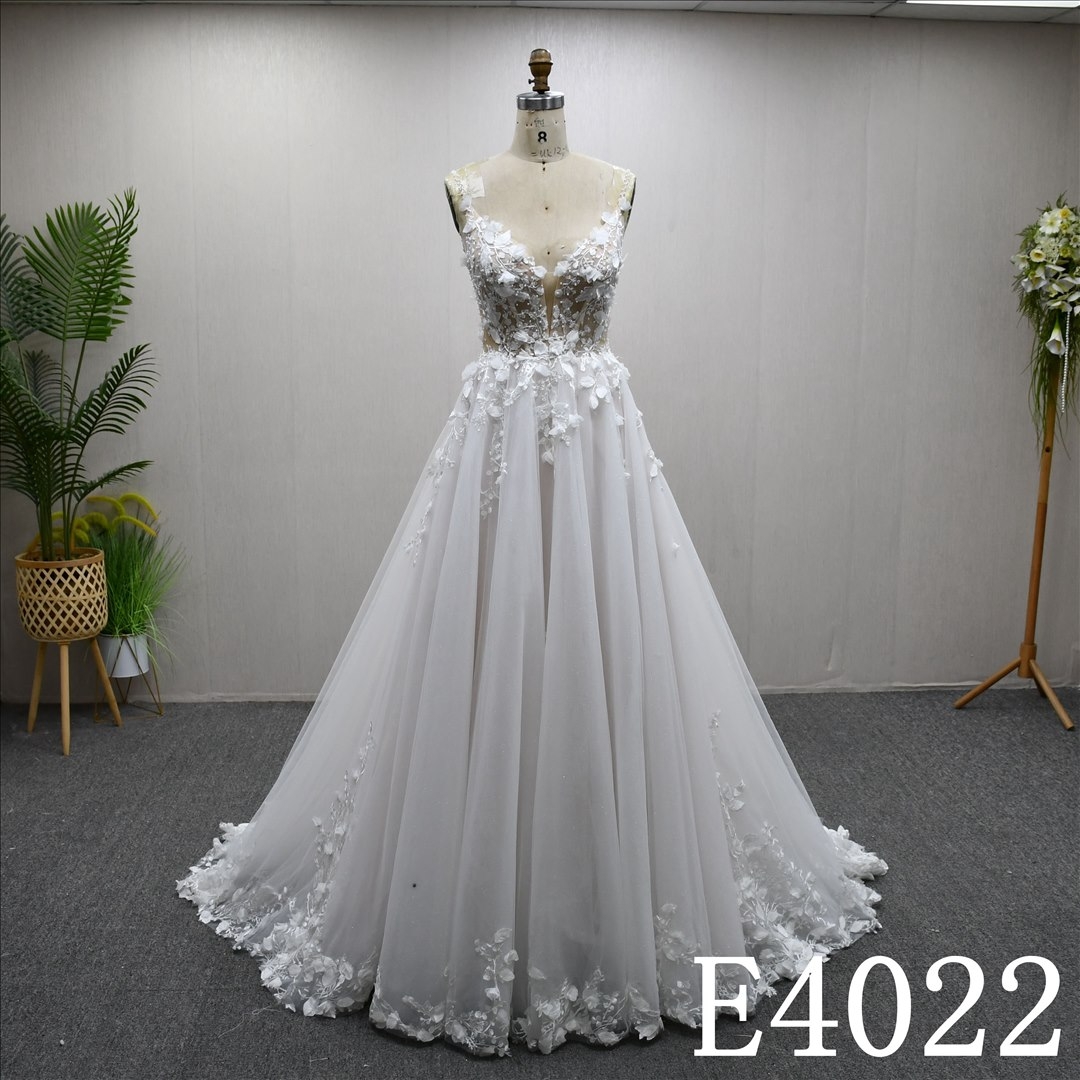 This best-selling A-line dress features a unique design with lace embellishments and a zippered button back.