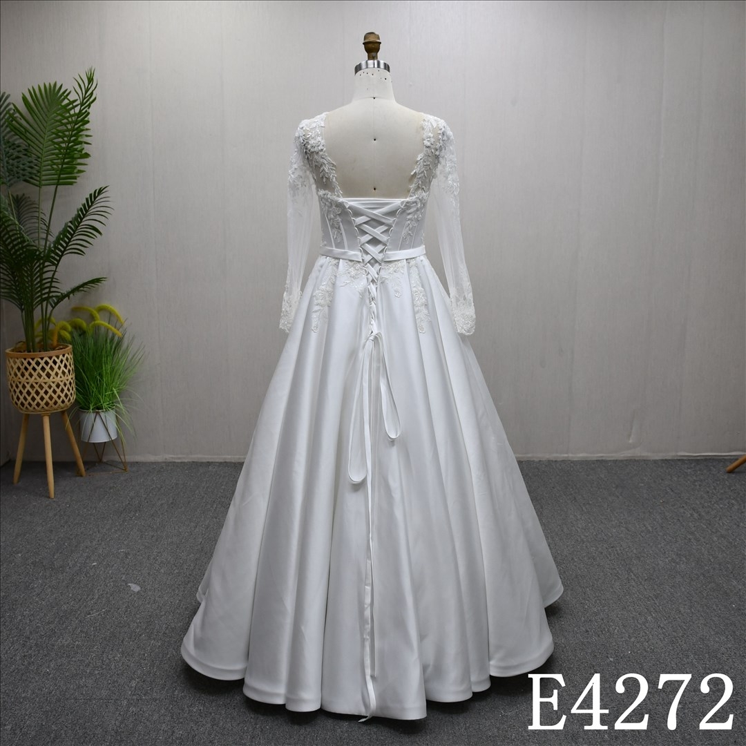 A beautiful and unique A-line long sleeves Illusion neckline lace wedding dress evening gown.