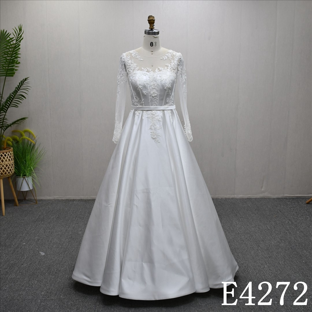 A beautiful and unique A-line long sleeves Illusion neckline lace wedding dress evening gown.