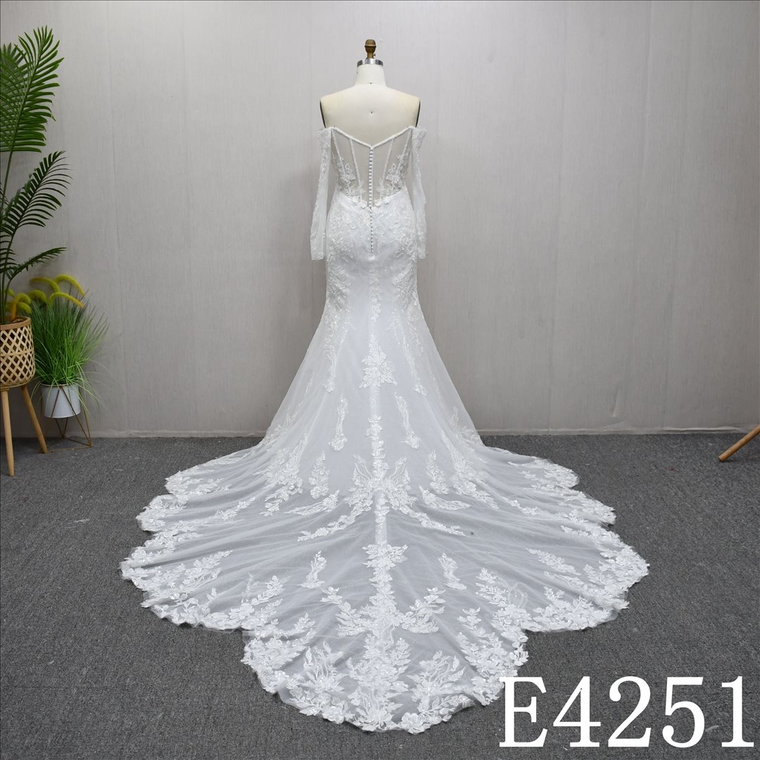 This Tulle Mermaid Long sleeves dress features Lace and Beading and Sequins design