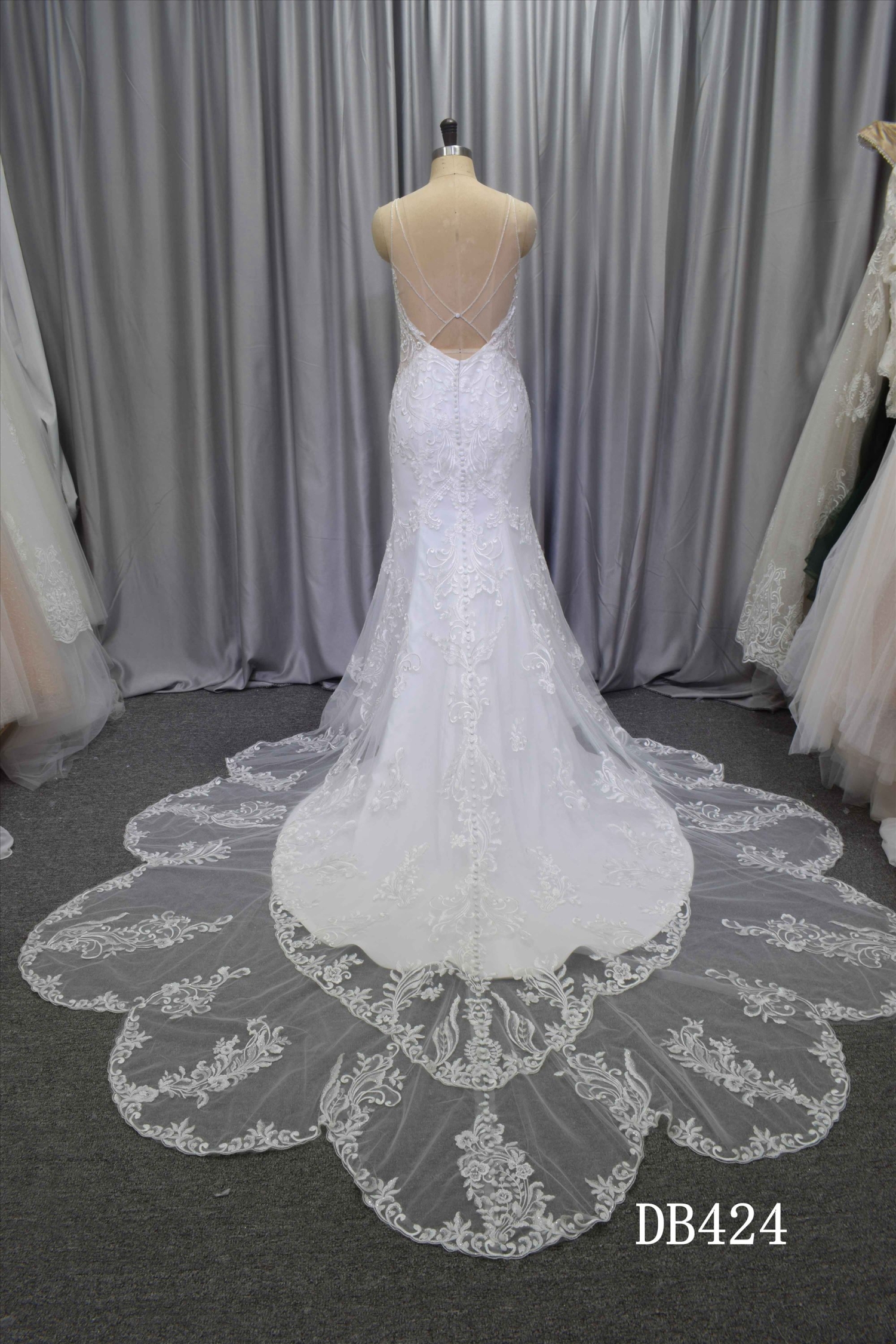 Illusion back wedding dress with curvy train