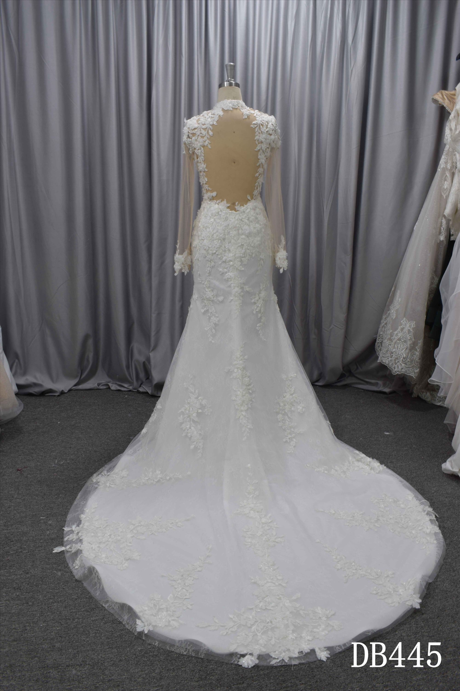 Long sleeves wedding dress with a split in the front of the skirt