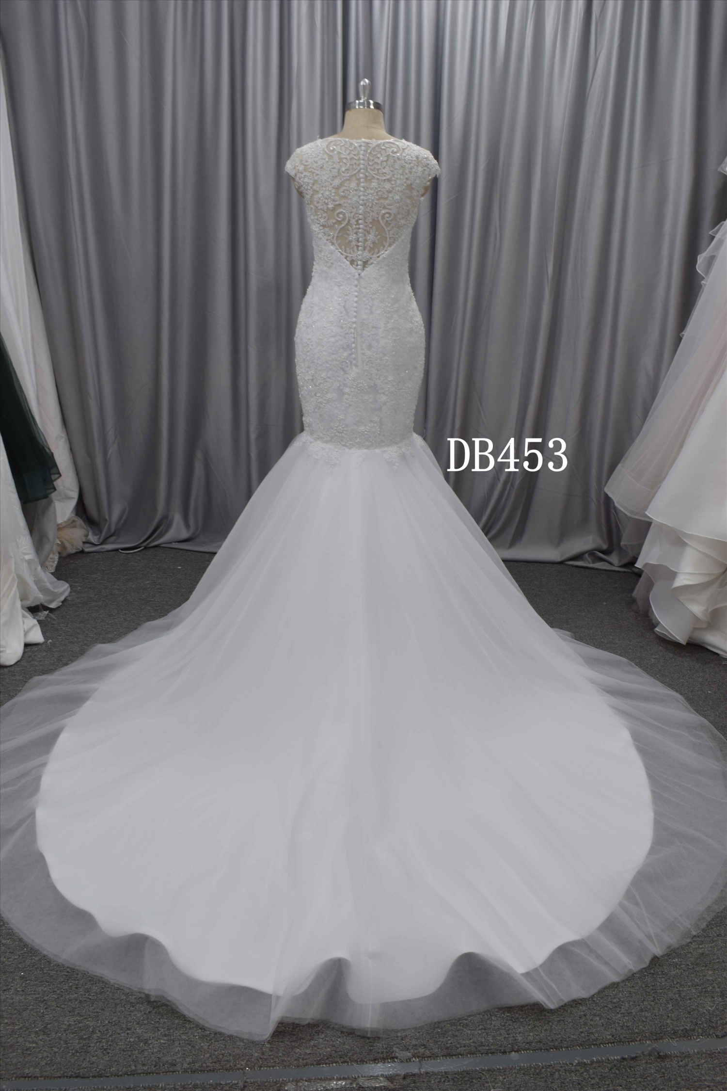 Beautiful mermaid wedding dress with delicate lace and beading