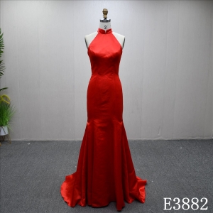 Elegant red fishtail evening dress with halter neckline and 3D flower decoration on the back