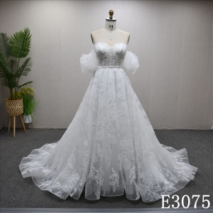 Beautiful ivory A-line wedding evening dress, off shoulder, with lace flowers all over
