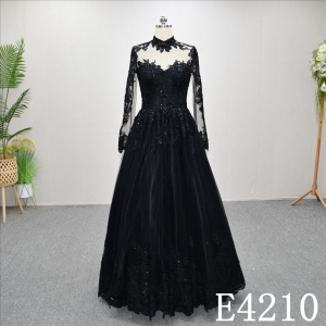 Unique A-line wedding dress in black, with a sweetheart neckline and intricate design
